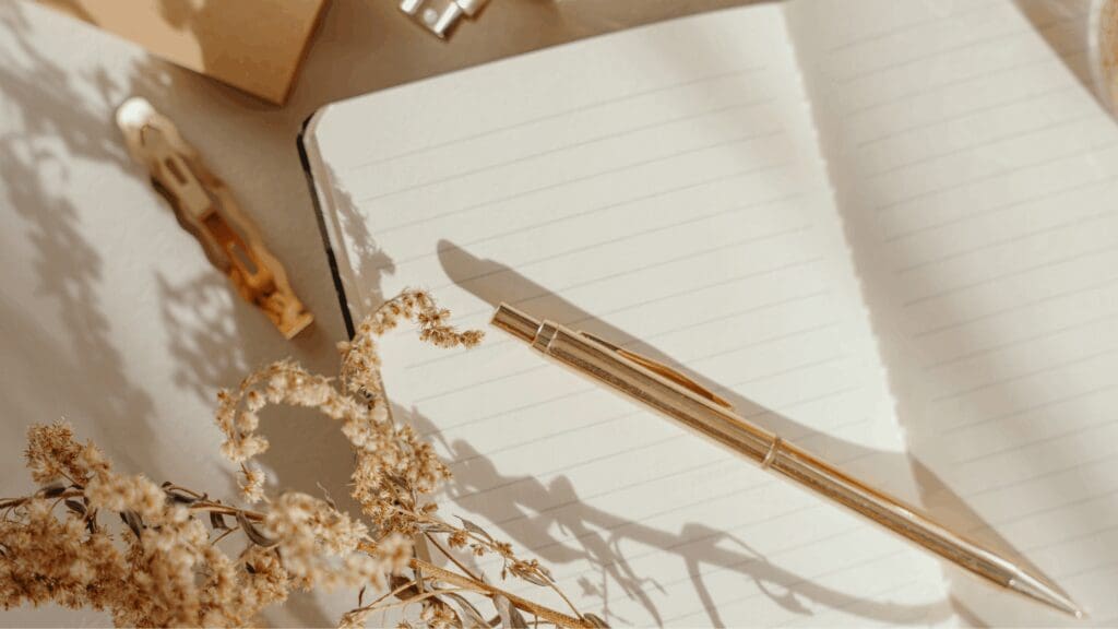 open journal and pen to plan out glp 1 diet plan